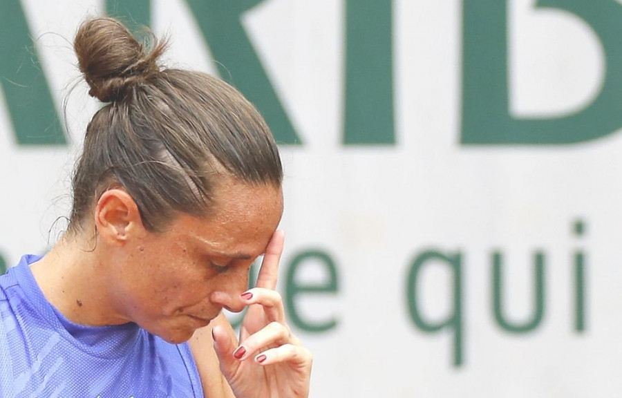 A Roberta Vinci le roban todos sus trofeos