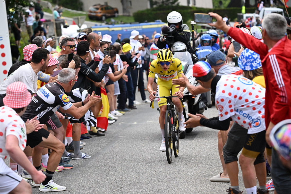 Saint-lary-soulan Pla D'adet (France), 13/07/2024.- Yellow jersey Slovenian rider Tadej Pogacar of UAE Team Emirates attacks on the ascent to Saint-Lary-Soulan - Pla d'ÄôAdet during the 14th stage o