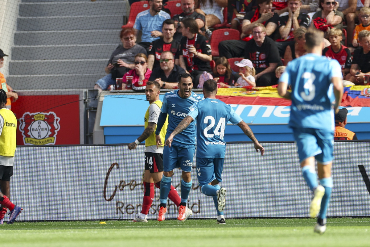 Leverkusen (Germany), 10/08/2024.- Juanmi of Betis Sevilla celebrates with teammates after scoring 0-1 during the friendly soccer match between Bayer 04 Leverkusen and Betis Sevilla in Leverkusen, Germany, 10 August 2024. (Futbol, Amistoso, Alemania) EFE/EPA/CHRISTOPHER NEUNDORF CONDITIONS - ATTENTION: The DFL regulations prohibit any use of photographs as image sequences and/or quasi-video.